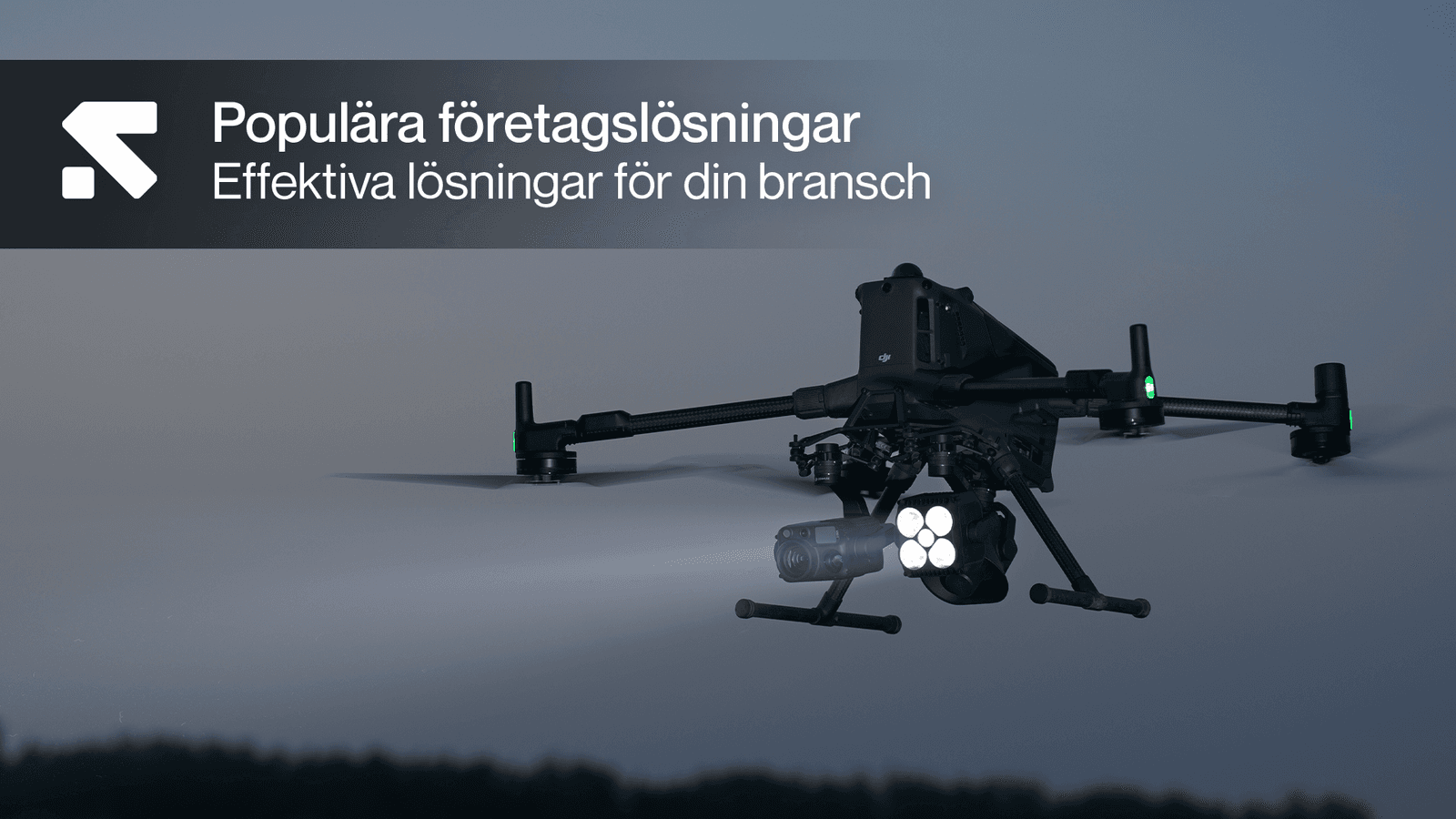 En drönare svävar i skymningen med lysande lampor, bredvid texten 'Populära företagslösningar - Effektiva lösningar för din bransch'.