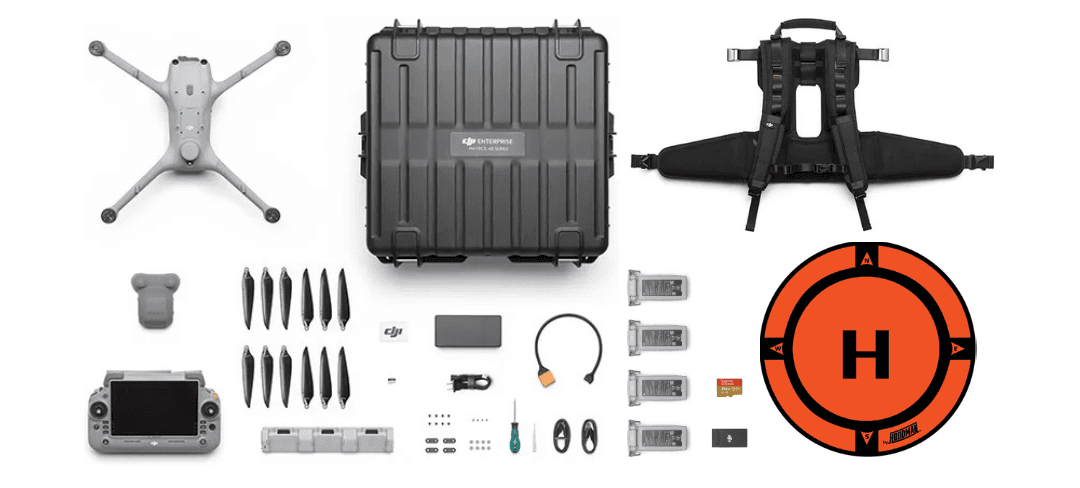 En drönare med tillbehör, inklusive propellrar, fjärrkontroll, batterier och en bärväska, ligger organiserade bredvid en landningsplatta.