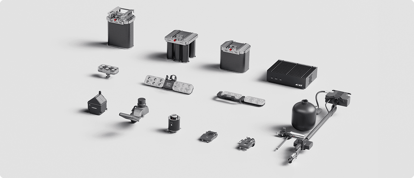 En samling av olika tekniska enheter från CZI är arrangerade på en ljusgrå bakgrund, inklusive släppsytem och elektroniska moduler.